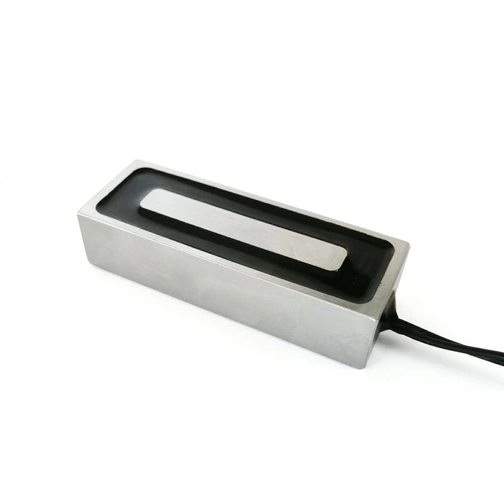 24V DC industrial electromagnetic gripper module with brushed steel body for fast pick and place